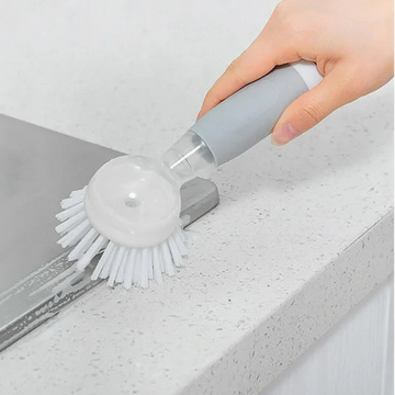 Cepillo con dispensador de jabón integrado