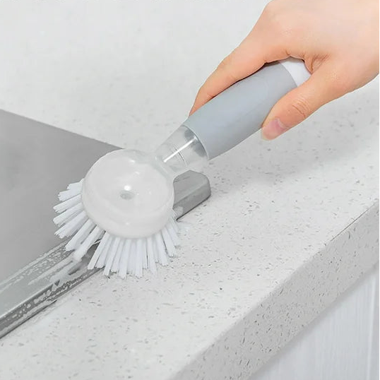 Cepillo con dispensador de jabón integrado